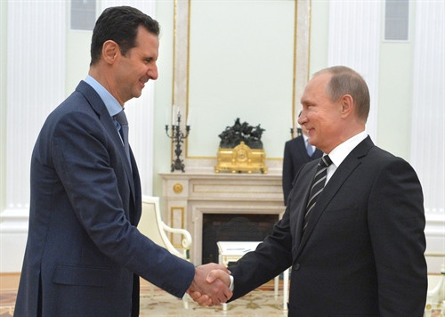 Trong ảnh (tư liệu): Tổng thống Nga Vladimir Putin (phải) và Tổng thống Syria Bashar al-Assad trong cuộc gặp ở thủ đô Moskva, Nga ngày 20/10/2015. EPA/TTXVN