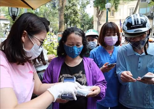 1 triệu khẩu trang miễn phí đã được phát cho người dân Thủ đô trong ngày 24/3/2020. Ảnh: Thanh Tùng-TTXVN