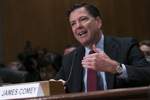 Trong ảnh (tư liệu): Giám đốc FBI James Comey tại phiên điều trần của Ủy ban các vấn đề Chính phủ và An ninh nội địa Thượng viện Mỹ ở Washington, DC, ngày 27/9. EPA/TTXVN