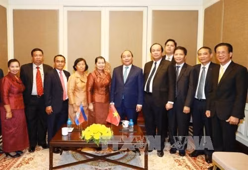 Tiếp tục chuyến thăm chính thức Vương quốc Campuchia, chiều 25/4, tại Thủ đô Phnom Penh, Thủ tướng Nguyễn Xuân Phúc tiếp bà Men Sam An, Phó Thủ tướng, Chủ tịch Hội hữu nghị Campuchia - Việt Nam. Ảnh: Thống Nhất - TTXVN