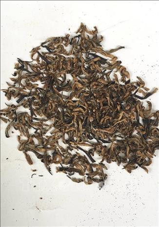 Trà Maijan Orthodox Golden của công ty trà Assam được trưng bày trong cuộc đấu giá tại Guwahati, Assam, Ấn Độ, ngày 31/7/2019. Ảnh: AFP/ TTXVN Trà Maijan Orthodox Golden của công ty trà Assam được trưng bày trong cuộc đấu giá tại Guwahati, Assam, Ấn Độ, ngày 31/7/2019. Ảnh: AFP/ TTXVN