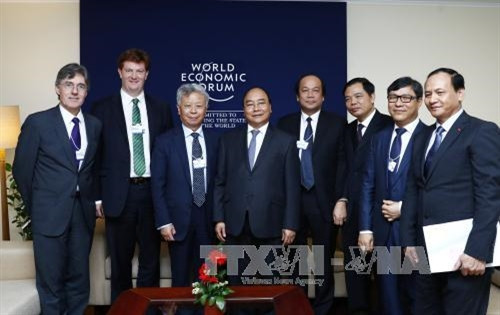 Thủ tướng Nguyễn Xuân Phúc tiếp Chủ tịch Ngân hàng Đầu tư cơ sở hạ tầng châu Á (AIIB) Kim Lập Quần. Ảnh: Thống Nhất – TTXVN. Thủ tướng Nguyễn Xuân Phúc tiếp Chủ tịch Ngân hàng Đầu tư cơ sở hạ tầng châu Á (AIIB) Kim Lập Quần. Ảnh: Thống Nhất – TTXVN.