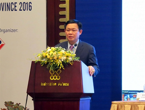 Phó Thủ tướng Chính phủ Vương Đình Huệ phát biểu tại hội nghị . Ảnh: Quốc Việt - TTXVN