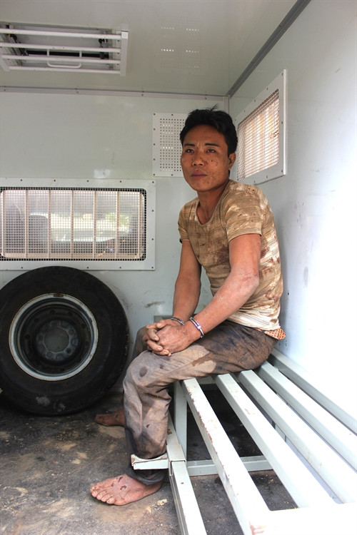 Nghi phạm Phù Minh Tuấn bị tạm giữ. Ảnh: Trung Thực - TTXVN phát Nghi phạm Phù Minh Tuấn bị tạm giữ. Ảnh: Trung Thực - TTXVN phát