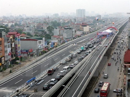 Đường vành đai 3 đoạn Thanh Xuân-Bắc hồ Linh Đàm trong ngày thông xe. (Ảnh: Huy Hùng/TTXVN) Đường vành đai 3 đoạn Thanh Xuân-Bắc hồ Linh Đàm trong ngày thông xe. (Ảnh: Huy Hùng/TTXVN)