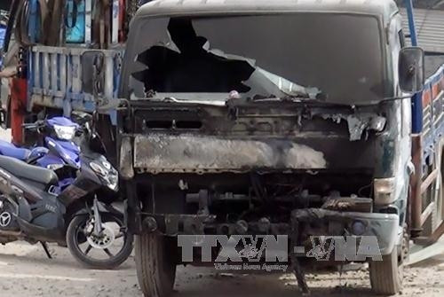 Chiếc xe ô tô bị cháy. Ảnh: Mạnh Linh-TTXVN