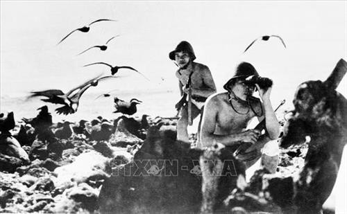 Lực lượng Đặc công hải quân Đoàn 126 giải phóng đảo Sinh Tồn thuộc quần đảo Trường Sa, ngày 28/4/1975. Ảnh: TTXVN phát Lực lượng Đặc công hải quân Đoàn 126 giải phóng đảo Sinh Tồn thuộc quần đảo Trường Sa, ngày 28/4/1975. Ảnh: TTXVN phát