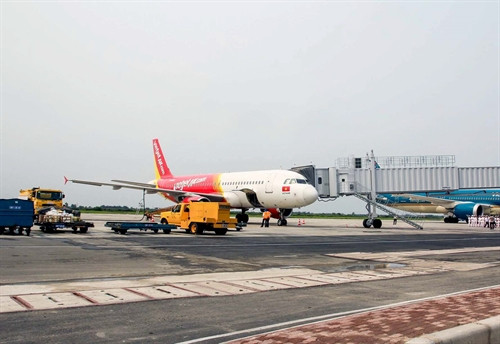 Máy bay của Hãng hàng không giá rẻ VietJet Air tại Cảng Hàng không quốc tế Cát Bi, Hải Phòng. Ảnh: Hoàng Ngọc-TTXVN Máy bay của Hãng hàng không giá rẻ VietJet Air tại Cảng Hàng không quốc tế Cát Bi, Hải Phòng. Ảnh: Hoàng Ngọc-TTXVN