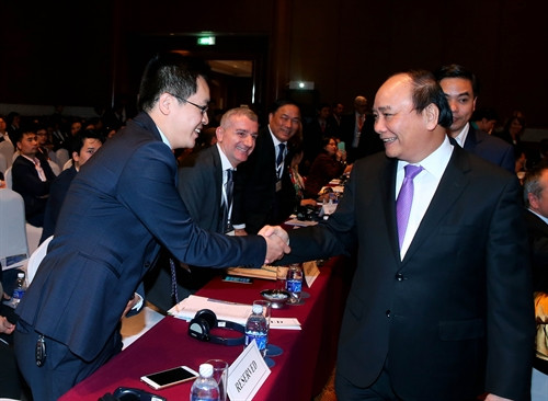 Thủ tướng Nguyễn Xuân Phúc với các đại biểu tham dự diễn đàn. Ảnh: Thống Nhất-TTXVN