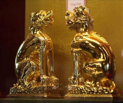 Hình tượng linh vật Nghê Việt được trưng bày tại triển lãm. Ảnh: Thanh Tùng-TTXVN Hình tượng linh vật Nghê Việt được trưng bày tại triển lãm. Ảnh: Thanh Tùng-TTXVN