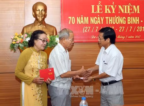 Thông tấn xã Việt Nam tổ chức Lễ kỷ niệm 70 năm Ngày Thương binh – Liệt sĩ ảnh 11