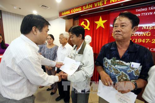 Thông tấn xã Việt Nam tổ chức Lễ kỷ niệm 70 năm Ngày Thương binh – Liệt sĩ ảnh 9 Thông tấn xã Việt Nam tổ chức Lễ kỷ niệm 70 năm Ngày Thương binh – Liệt sĩ ảnh 9