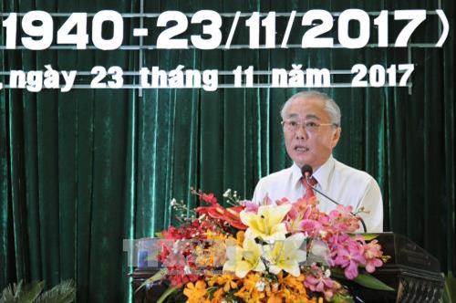 Bí thư Huyện ủy Huyện Hóc Môn Nguyễn Cư phát biểu tại buổi họp mặt. Ảnh: An Hiếu - TTXVN