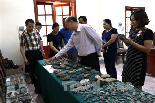 Khai quật di chỉ tiền sử hang Pắc Tà ảnh 1