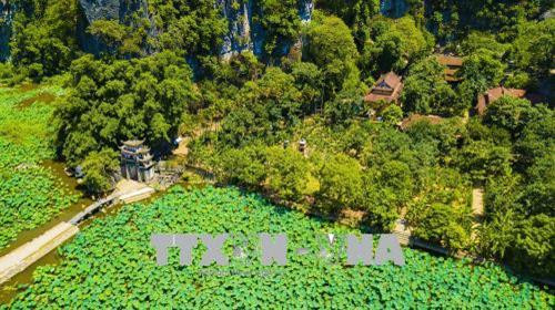 Khung cảnh thiên nhiên hoang sơ tại Tam Cốc - Bích Động. Ảnh: Minh Đức - TTXVN Khung cảnh thiên nhiên hoang sơ tại Tam Cốc - Bích Động. Ảnh: Minh Đức - TTXVN