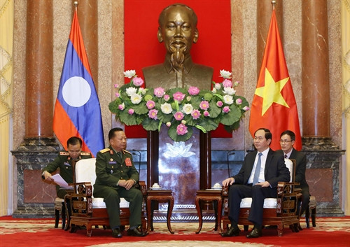 Chủ tịch nước Trần Đại Quang tiếp Bộ trưởng Quốc phòng CHDCND Lào Chansamon Channhalat đang trong chuyến thăm chính thức Việt Nam. Ảnh: Nhan Sáng-TTXVN Chủ tịch nước Trần Đại Quang tiếp Bộ trưởng Quốc phòng CHDCND Lào Chansamon Channhalat đang trong chuyến thăm chính thức Việt Nam. Ảnh: Nhan Sáng-TTXVN