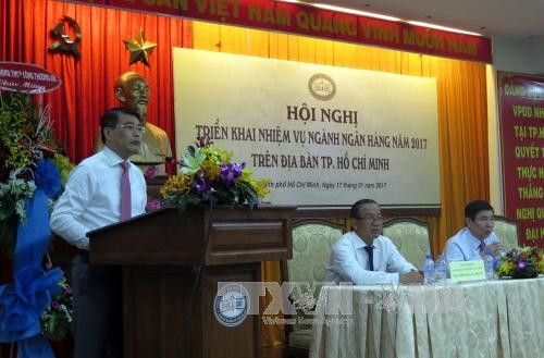 Thống đốc Ngân hàng Nhà nước Việt Nam Lê Minh Hưng phát biểu tại hội nghị. Ảnh: Hoàng Hải – TTXVN