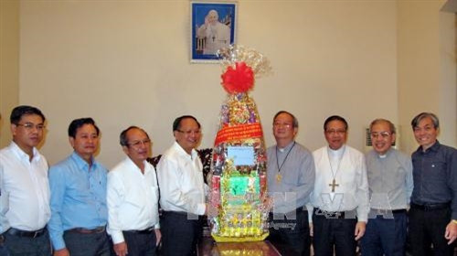 Đoàn công tác đến thăm, chúc Tết các linh mục tại Tòa Tổng Giám mục Tổng Giáo phận Sài Gòn. Ảnh: Thế Anh – TTXVN