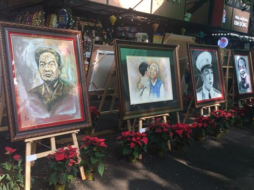 Một số tác phẩm tranh, ảnh được trưng bày tại đường sách Nguyễn Van Bình