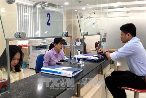 Với cơ chế, chính sách đặc thù, cán bộ, công chức ở Thành phố Hồ Chí Minh hoàn thành tốt nhiệm vụ sẽ được hưởng mức chi thu nhập tăng thêm gắn với năng suất, hiệu quả công việc. Ảnh: TTXVN