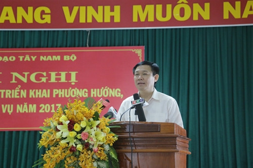 Phó Thủ tướng, Trưởng Ban Chỉ đạo Tây Nam bộ Vương Đình Huệ phát biểu tại hội nghị. Ảnh: Ngọc Thiện- TTXVN