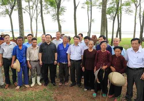 Bí thư Thành ủy Hà Nội Hoàng Trung Hải thăm một số mô hình sản xuất nông nghiệp ở Ba Vì ảnh 1