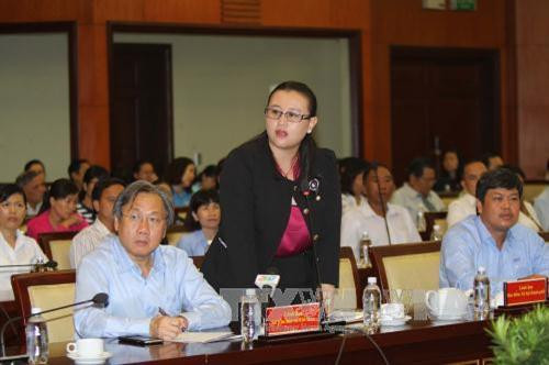 CNVC - LĐ tiêu biểu Nguyễn Đoàn Phi Phượng, Văn phòng UBND quận 8 phát biểu tại buổi gặp gỡ. Ảnh: Thanh Vũ - TTXVN