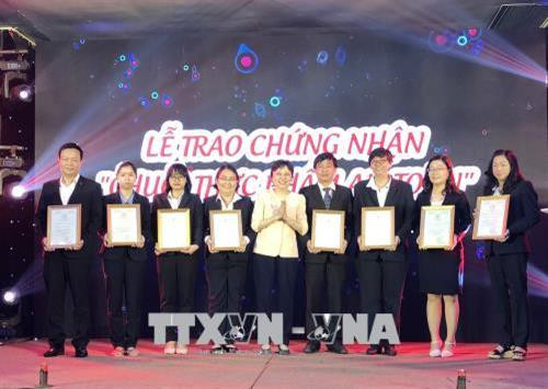 Quang cảnh Lễ trao chứng nhận "Chuỗi thực phẩm an toàn". Ảnh: Mỹ Phương - TTXVN