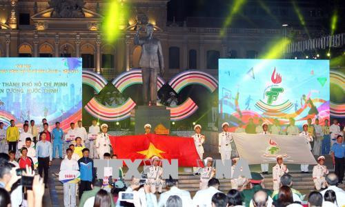 Nghi thức rước Quốc kỳ và cờ Đại hội. Ảnh: Quang Nhựt - TTXVN