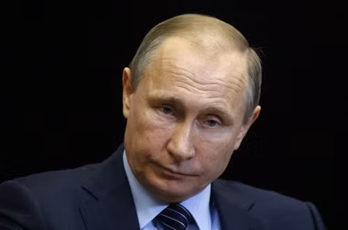 Tổng thống Nga Vladimir Putin phát biểu trên truyền hình ngày 25/11. Ảnh: AFP/ TTXVN