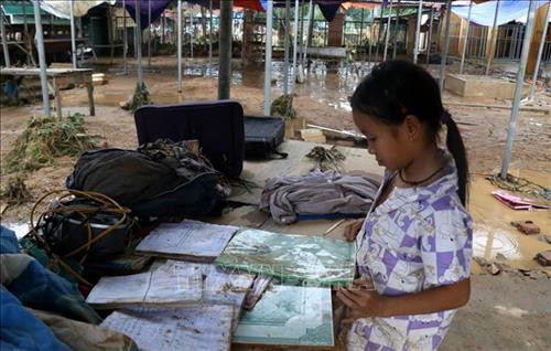 Người dân xã Nghĩa Đô, huyện Bảo Yên khắc phục hậu quả sau mưa lũ. Ảnh: Quốc Khánh – TTXVN Người dân xã Nghĩa Đô, huyện Bảo Yên khắc phục hậu quả sau mưa lũ. Ảnh: Quốc Khánh – TTXVN