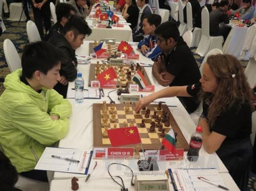 Các kỳ thủ tranh tài tại giải đấu. Ảnh : Hoàng Hải-TTXVN Các kỳ thủ tranh tài tại giải đấu. Ảnh : Hoàng Hải-TTXVN