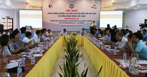 Hội thảo Quốc tế “Tăng cường nguồn lực hỗ trợ ứng phó với biến đổi khí hậu". Ảnh: Công Mạo-TTXVN.