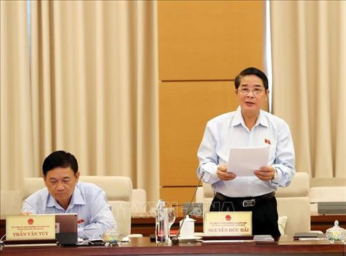 Chủ nhiệm Ủy ban Tài chính - Ngân sách của Quốc hội Nguyễn Đức Hải trình bày báo báo. Ảnh: Trọng Đức - TTXVN Chủ nhiệm Ủy ban Tài chính - Ngân sách của Quốc hội Nguyễn Đức Hải trình bày báo báo. Ảnh: Trọng Đức - TTXVN