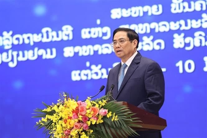 Thủ tướng Phạm Minh Chính phát biểu tại buổi lễ. Ảnh: Dương Giang - TTXVN Thủ tướng Việt Nam và Thủ tướng Lào đồng chủ trì Lễ phát động Năm Đoàn kết Hữu nghị Việt Nam-Lào, Lào-Việt Nam 2022 ảnh 2