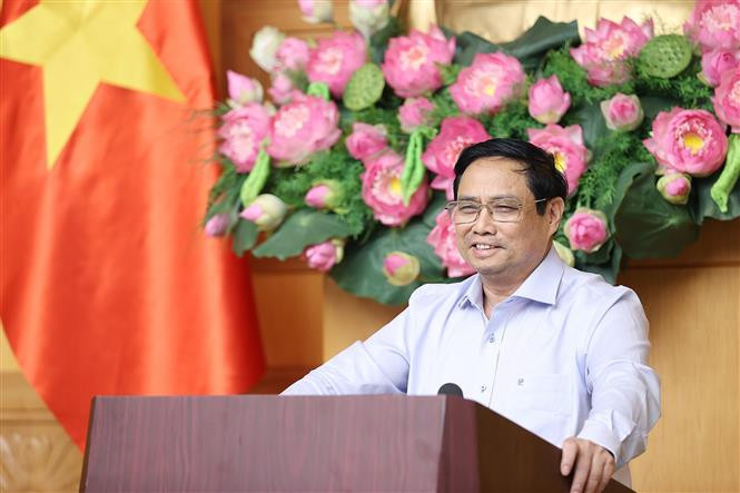 Thủ tướng Phạm Minh Chính kết luận buổi làm việc. Ảnh: Dương Giang - TTXVN Thủ tướng Chính phủ họp với các chuyên gia, nhà khoa học về ổn định kinh tế vĩ mô, kiểm soát lạm phát ảnh 7