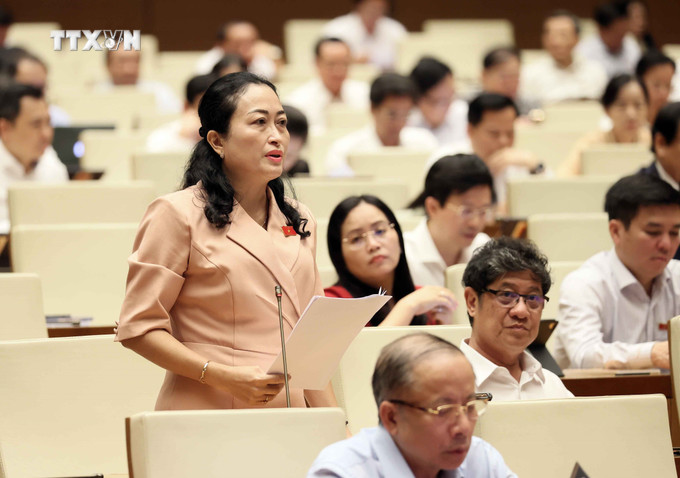 Đại biểu Quốc hội tỉnh Bạc Liêu Trần Thị Hoa Ry phát biểu. Ảnh: An Đăng – TTXVN vna_potal_ky_hop_thu_7_quoc_hoi_khoa_xv_quoc_hoi_thao_luan_ve_du_thao_luat_bao_hiem_xa_hoi_sua_doi_7397310.jpg