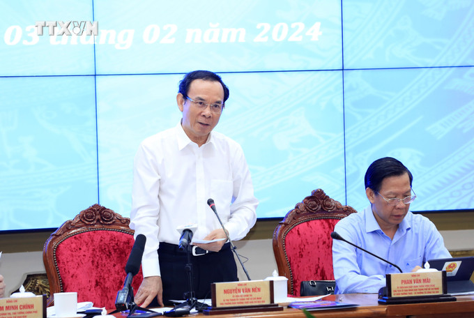 Bí thư Thành ủy Thành phố Hồ Chí Minh Nguyễn Văn Nên báo cáo tại Hội nghị. Ảnh: Văn Điệp – TTXVN vna_potal_thu_tuong_chu_tri_hoi_nghi_trien_khai_nghi_quyet_982023qh15_cua_quoc_hoi_7211676.jpg