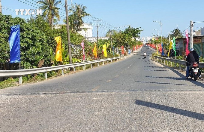 Huyện Cầu Kè đạt chuẩn huyện nông thôn mới nâng cao. Ảnh: Thanh Hòa-TTXVN vna_potal_nhieu_chuyen_bien_o_vung_nong_thon_tra_vinh_7529332.jpg