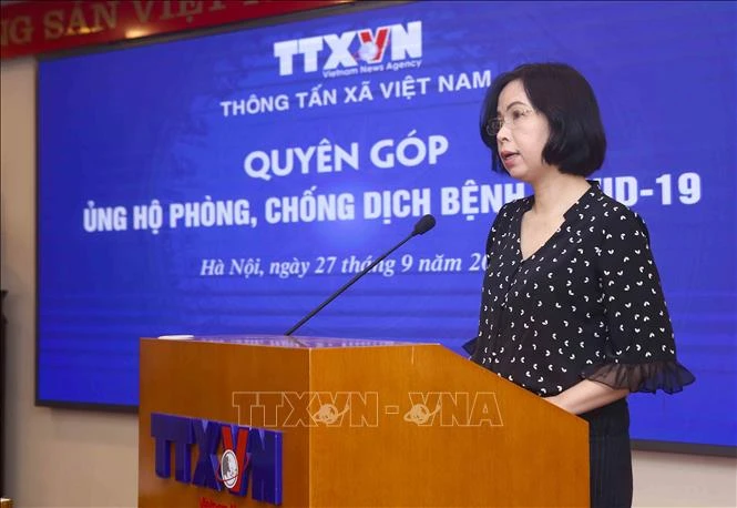 Cán bộ, nhân viên TTXVN quyên góp ủng hộ công tác phòng, chống dịch COVID-19