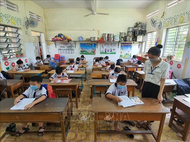 Các trường đánh giá học sinh phù hợp với hình thức tổ chức dạy học ứng phó với dịch COVID-19. Ảnh: Ánh Tuyết - TTXVN