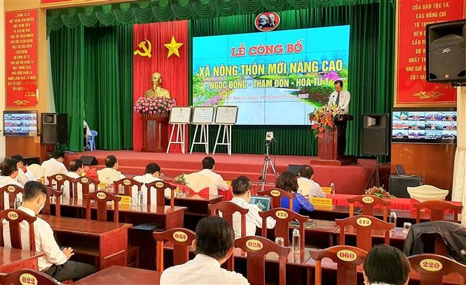 Quang cảnh Lễ công bố xã nông thôn mới nâng cao. Ảnh: Trung Hiếu - TTXVN