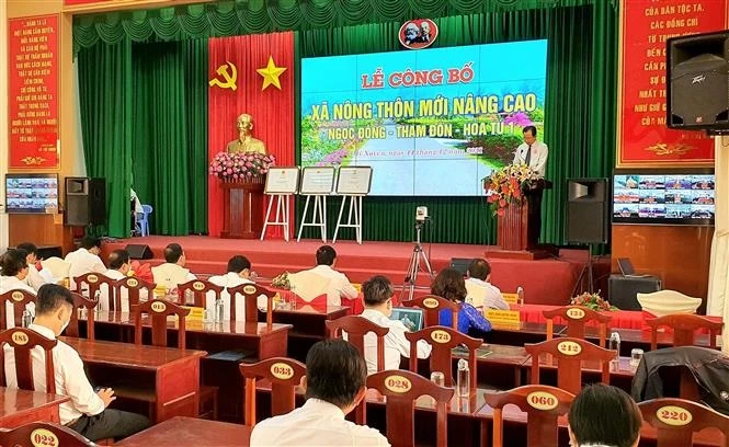 Quang cảnh Lễ công bố xã nông thôn mới nâng cao. Ảnh: Trung Hiếu - TTXVN