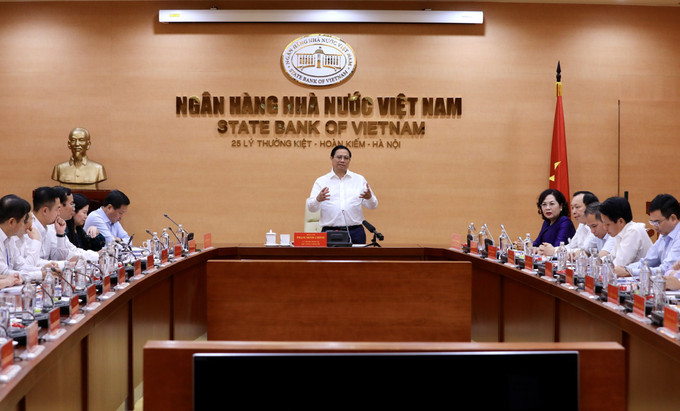 Thủ tướng Phạm Minh Chính phát biểu tại buổi làm việc với lãnh đạo các ngân hàng. Ảnh: Lâm Khánh - TTXVN Thủ tướng và những chuyến đi ảnh 5