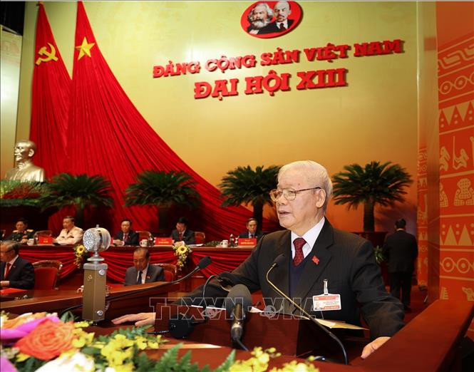 Đồng chí Nguyễn Phú Trọng, Tổng Bí thư Ban Chấp hành Trung ương Đảng, Chủ tịch nước CHXHCN Việt Nam đọc Báo cáo chính trị của Ban Chấp hành Trung ương Đảng khóa XII và các văn kiện trình Đại hội. Ảnh: TTXVN Toàn văn Báo cáo của Ban Chấp hành Trung ương Đảng khóa XII về các văn kiện trình Đại hội XIII của Đảng ảnh 1