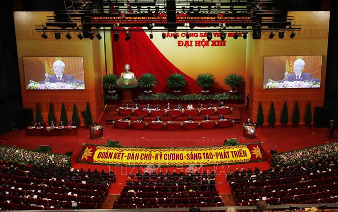 Đại hội nghe đồng chí Nguyễn Phú Trọng, Tổng Bí thư Ban Chấp hành Trung ương Đảng, Chủ tịch nước CHXHCN Việt Nam đọc Báo cáo chính trị của Ban Chấp hành Trung ương Đảng khóa XII và các văn kiện trình Đại hội. Ảnh: TTXVN Toàn văn Báo cáo của Ban Chấp hành Trung ương Đảng khóa XII về các văn kiện trình Đại hội XIII của Đảng ảnh 2