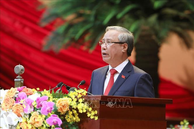 Đồng chí Trần Quốc Vượng, Ủy viên Bộ Chính trị, Thường trực Ban Bí thư thay mặt Đoàn Chủ tịch tuyên bố lý do, giới thiệu đại biểu và khách mời của Đại hội. Ảnh: TTXVN Khai mạc trọng thể Đại hội đại biểu toàn quốc lần thứ XIII Đảng Cộng sản Việt Nam ảnh 5