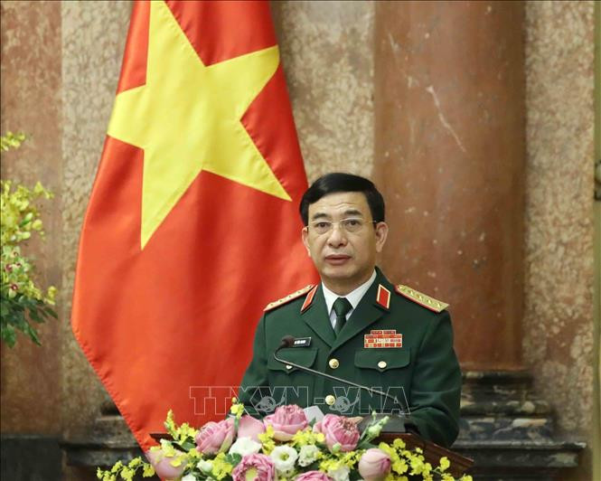 Đại tướng Phan Văn Giang, Ủy viên Bộ Chính trị, Phó Bí thư Quân ủy Trung ương, Bộ trưởng Bộ Quốc phòng phát biểu. Ảnh: Thống Nhất – TTXVN Trao quyết định thăng quân hàm Đại tướng cho Bộ trưởng Quốc phòng Phan Văn Giang ảnh 4