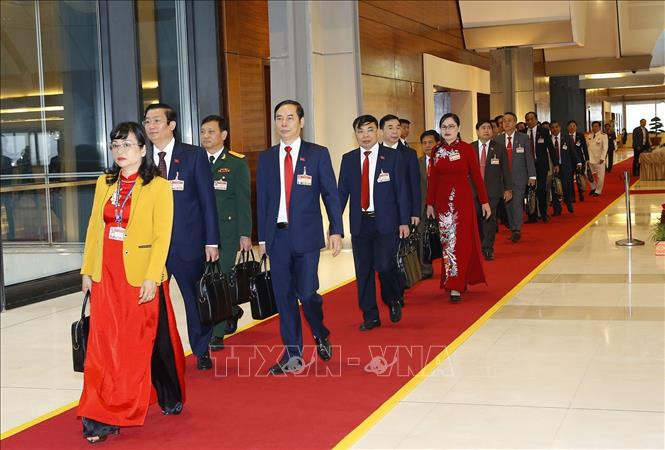Các đại biểu đến dự phiên khai mạc Đại hội. Ảnh: TTXVN Một số hình ảnh trước giờ khai mạc Đại hội đại biểu toàn quốc lần thứ XIII của Đảng ảnh 13