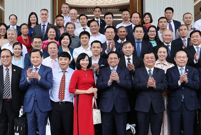Thủ tướng Phạm Minh Chính với các đại biểu dự Diễn đàn Kinh tế hợp tác, hợp tác xã năm 2022. Ảnh: Dương Giang-TTXVN Thủ tướng Phạm Minh Chính: Các hợp tác xã phải chủ động chuyển đổi số để tồn tại và phát triển ảnh 4